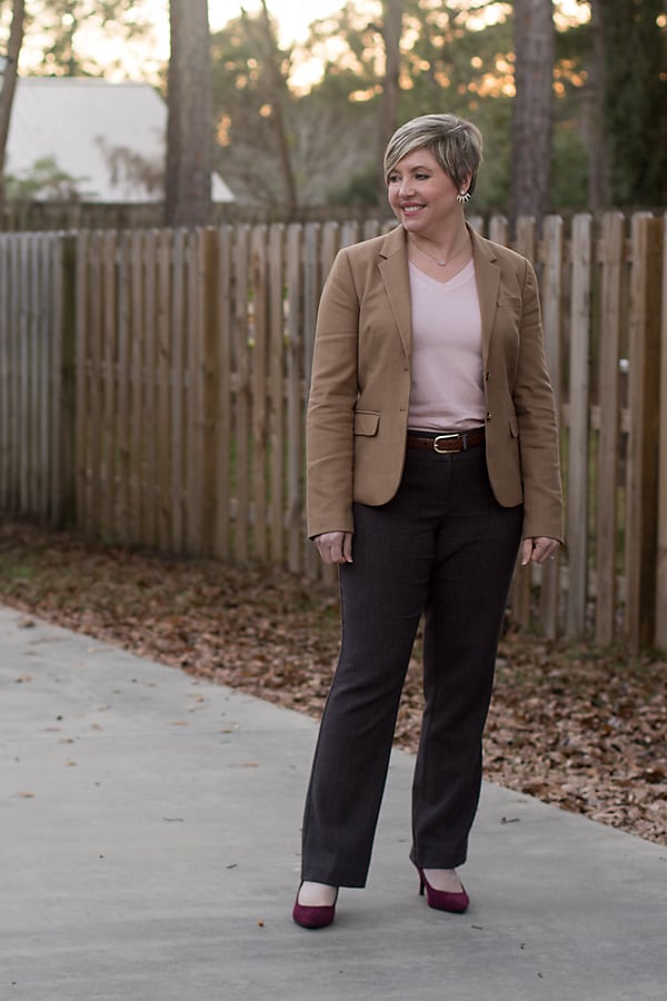 womens office outfit with camel blazer, pink sweater and brown pants
