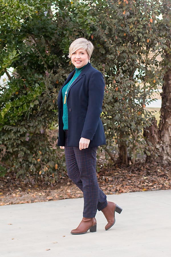 women's winter outfit with navy blazer, plaid pants and teal green sweater