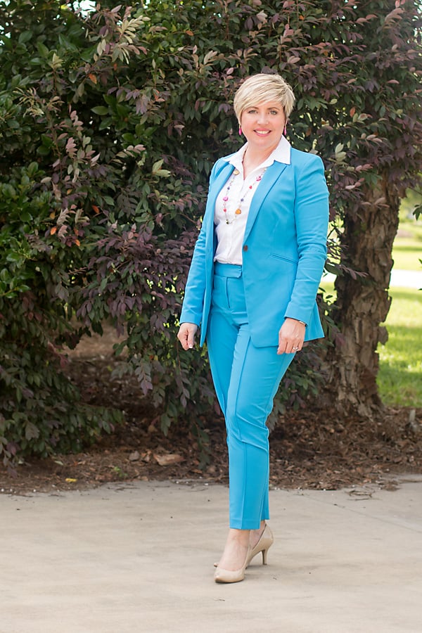 bright suit with white button up