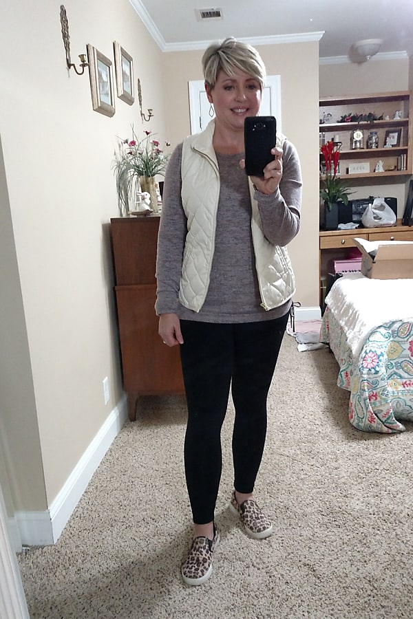 puffer vest with leggings and leopard sneakers atheleisure outfit