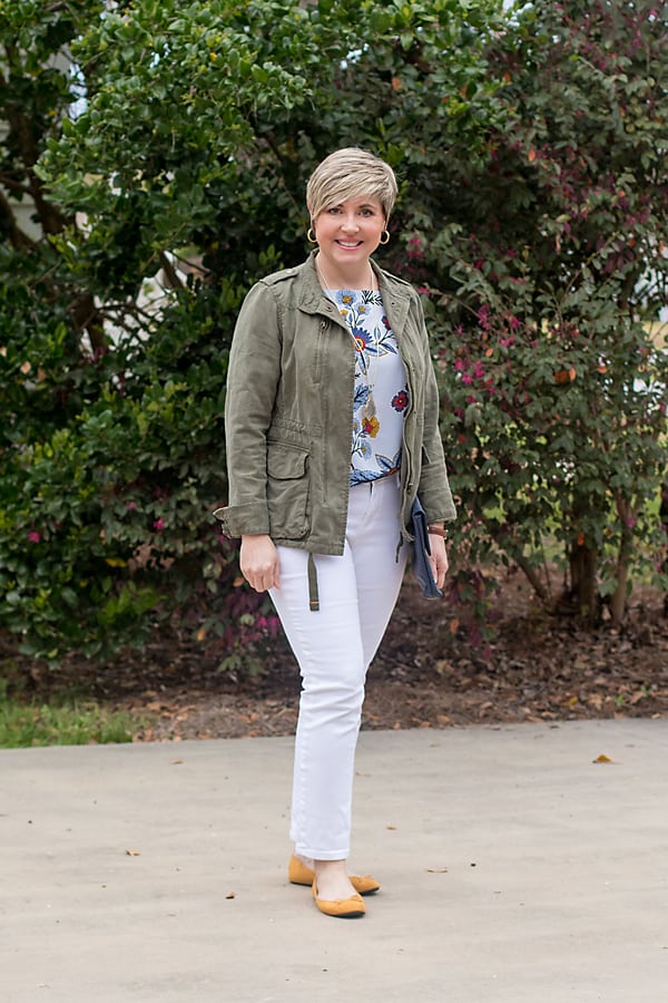 white jeans outfit with utility jacket