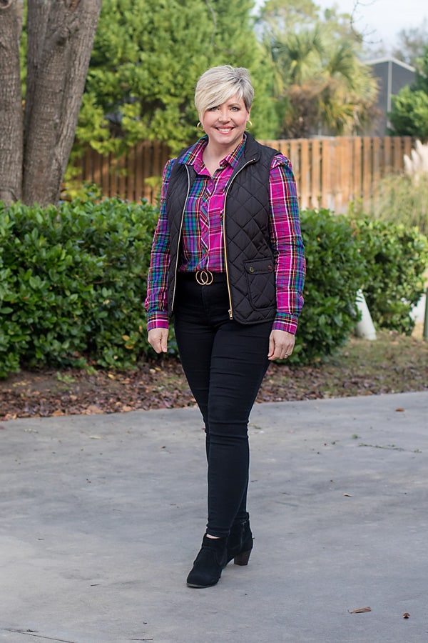 black quilted vest with plaid shirt