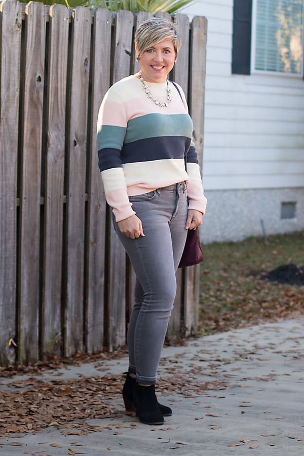 grey jeans with striped winter sweater