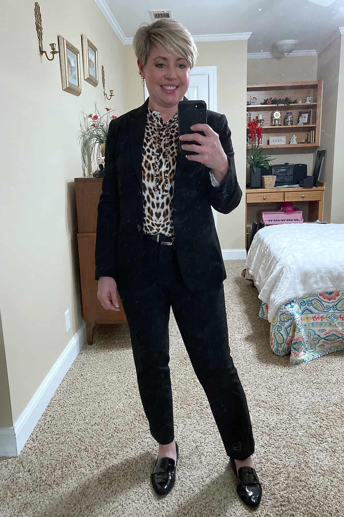 black suit and leopard top office outfit