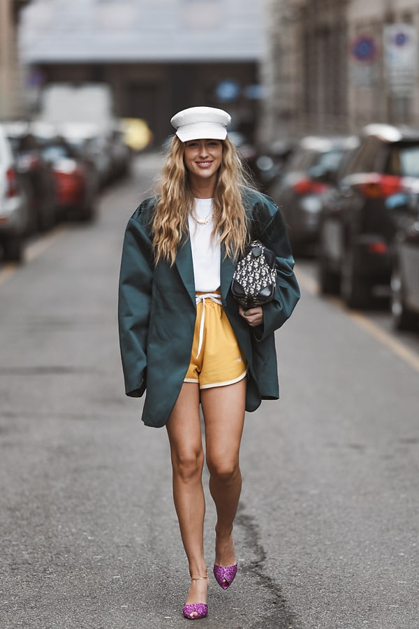 eclectic outfit of blazer and athletic shorts